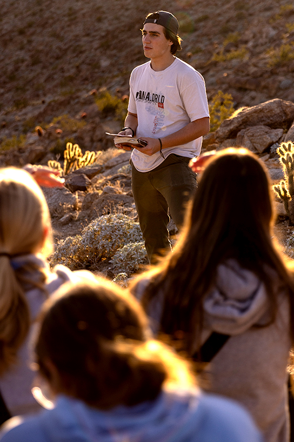 CBU student leading an outdoor bible study