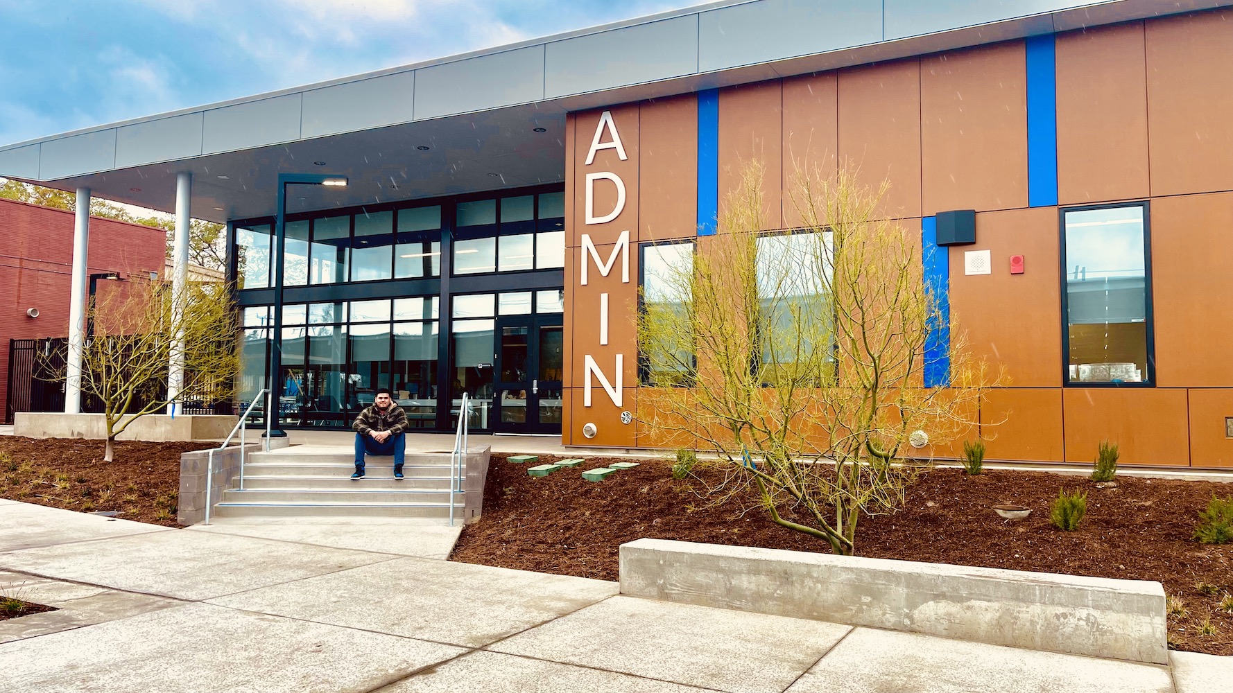 VICTOR in front of his first completed project