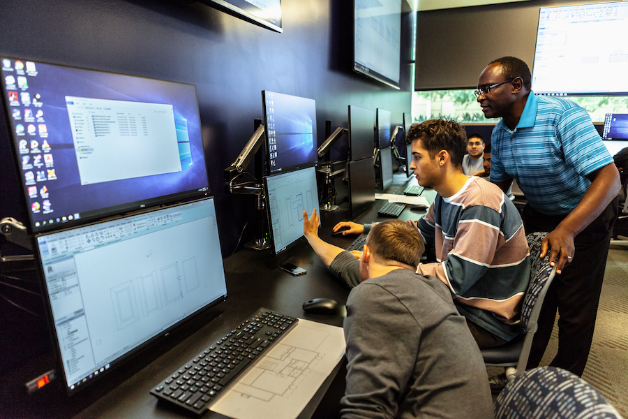Students and professor in computer lab