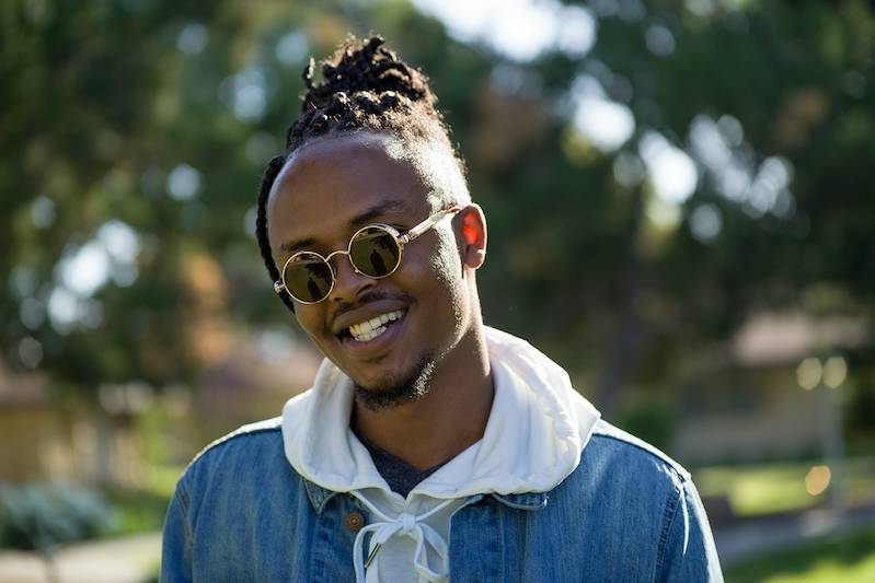 A smiling male CBU student