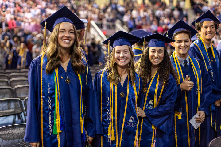 graduates wearing cap and gown