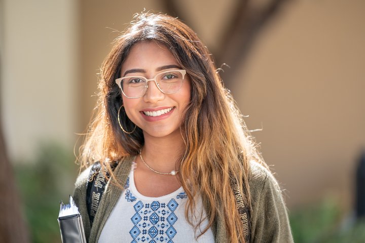 Student smiling on campus