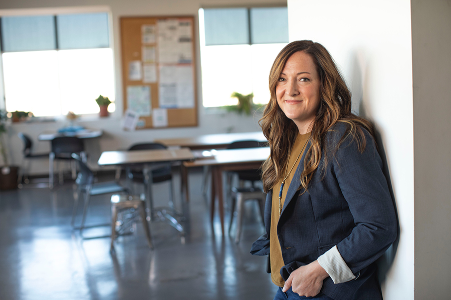 woman leaning on wall