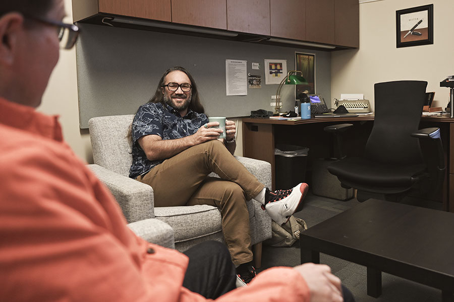 people sitting in armchairs