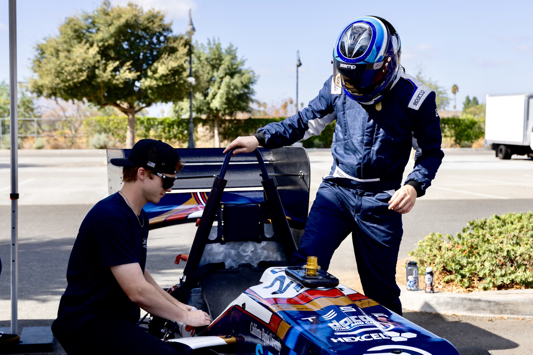 Driver stepping into Charger 4