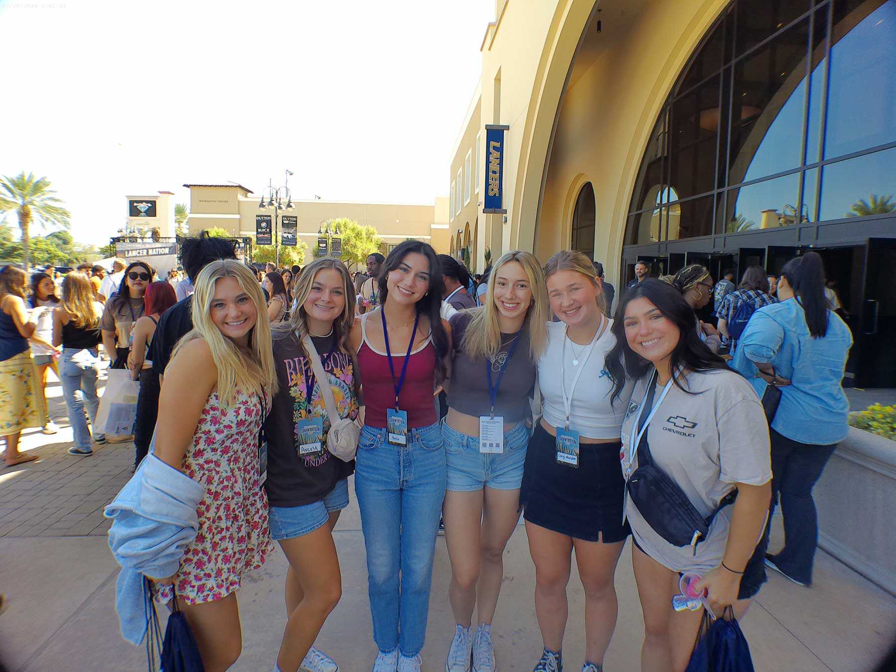 Students posing in front of Events Center