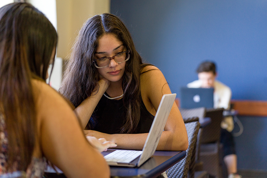 students with laptop
